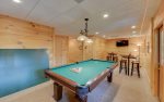 Basement Features Pool Table With Ping Pong Conversion Top, High Top Tables, and Flat Screen Tv